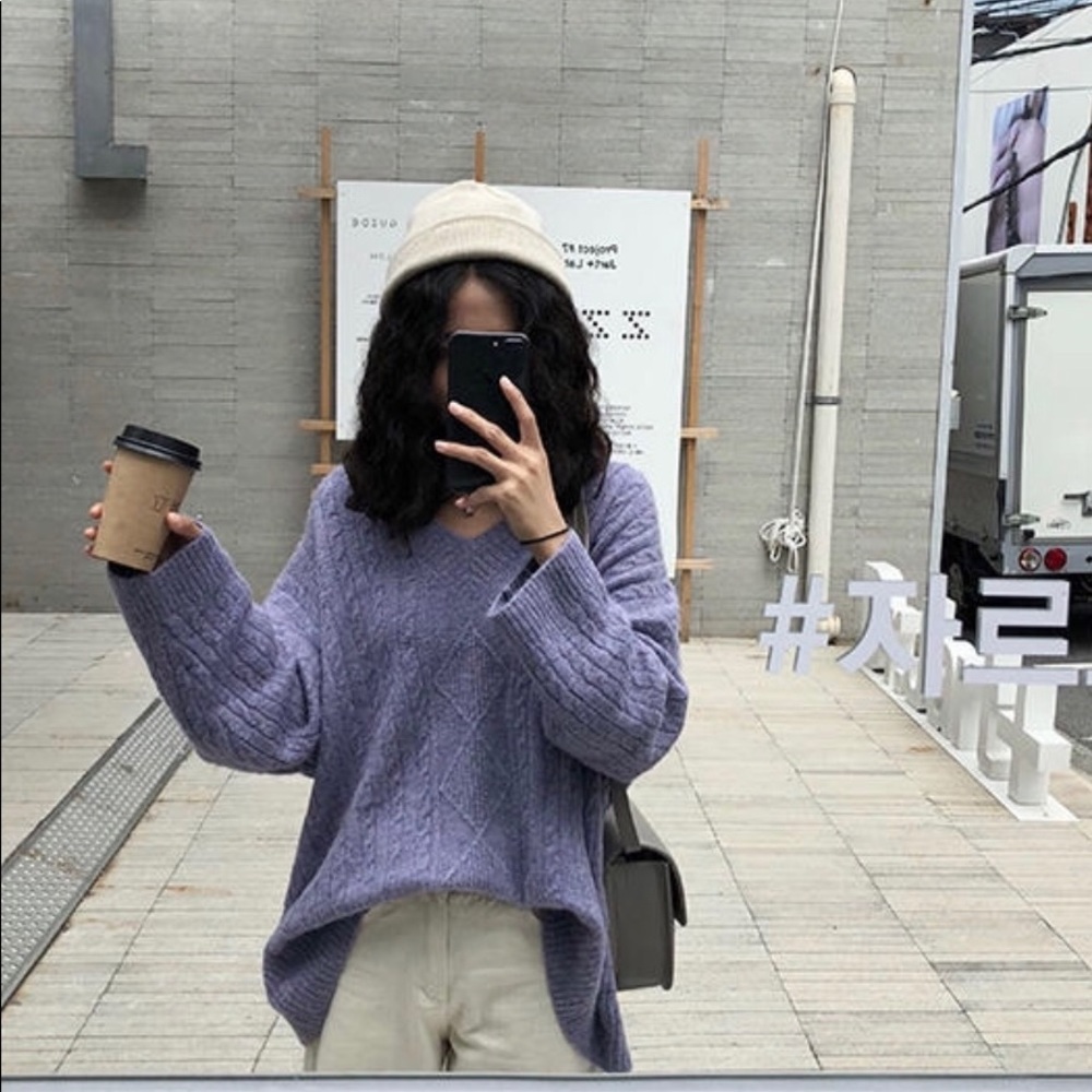 purple knitted sweater